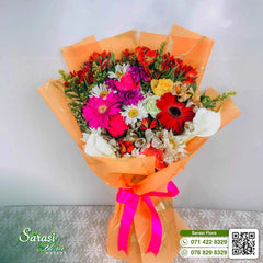 Cheerful Multicolored Gerbera Daisy Bouquet in Orange Wrapping