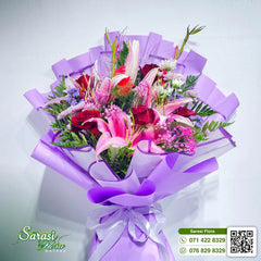 Stunning Pink Stargazer Lily Bouquet with Purple Tulle Wrapping