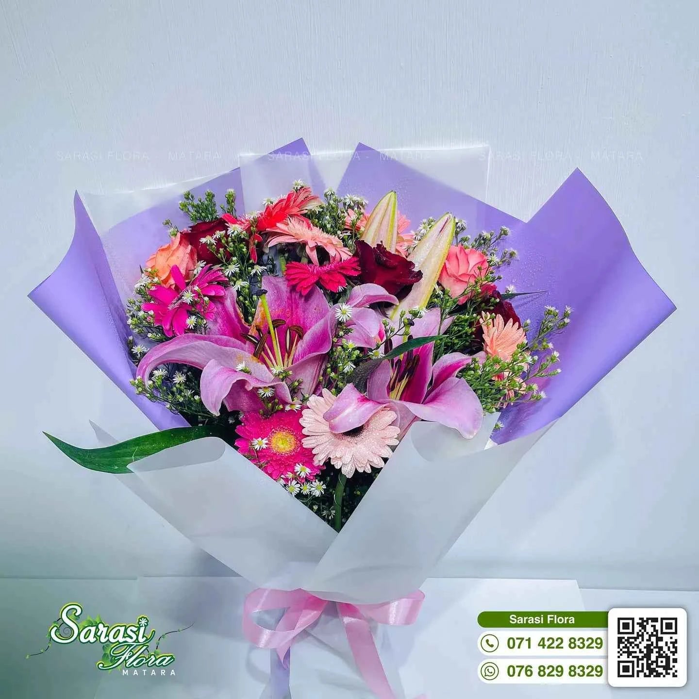 Vibrant Fuchsia Pink Lily and Rose Bouquet in Purple Wrapping