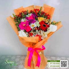 Cheerful Multicolored Gerbera Daisy Bouquet in Orange Wrapping