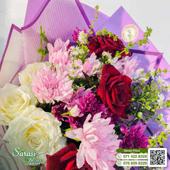 Luxurious Burgundy and Cream Rose Bouquet with Purple Wrapping