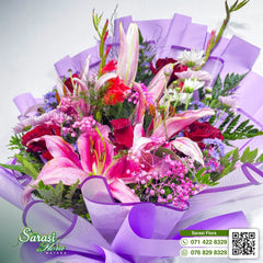 Stunning Pink Stargazer Lily Bouquet with Purple Tulle Wrapping