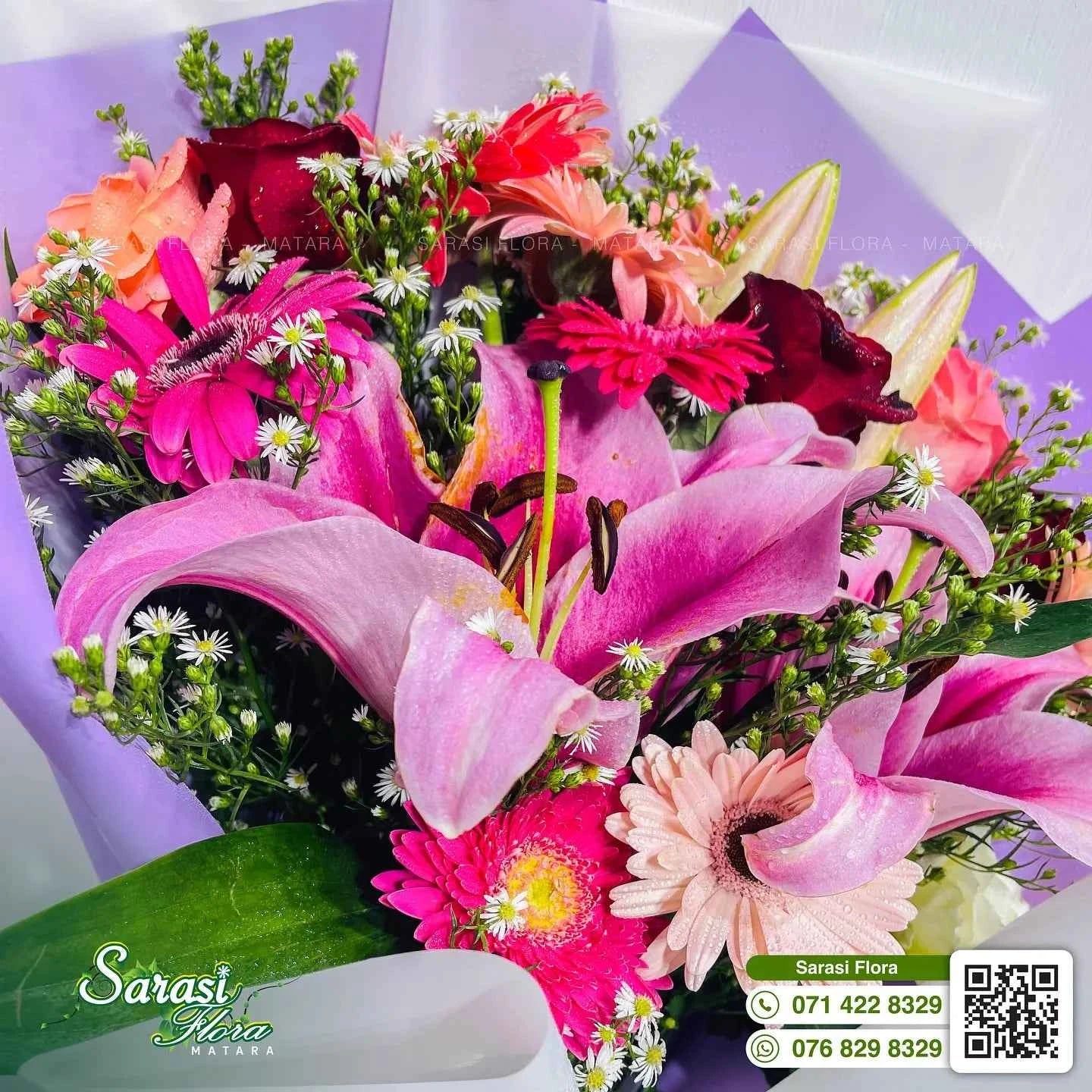 Vibrant Fuchsia Pink Lily and Rose Bouquet in Purple Wrapping