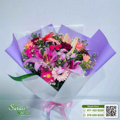 Vibrant Fuchsia Pink Lily and Rose Bouquet in Purple Wrapping